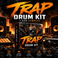 Digital product cover for a 'TRAP DRUM KIT' featuring a central product box with a skull and crown graphic, surrounded by studio gear like speakers, a sampler, and a keyboard in a dark, fiery orange and black setting. Text highlights '1,029 SAMPLES' and lists sample types at the bottom.